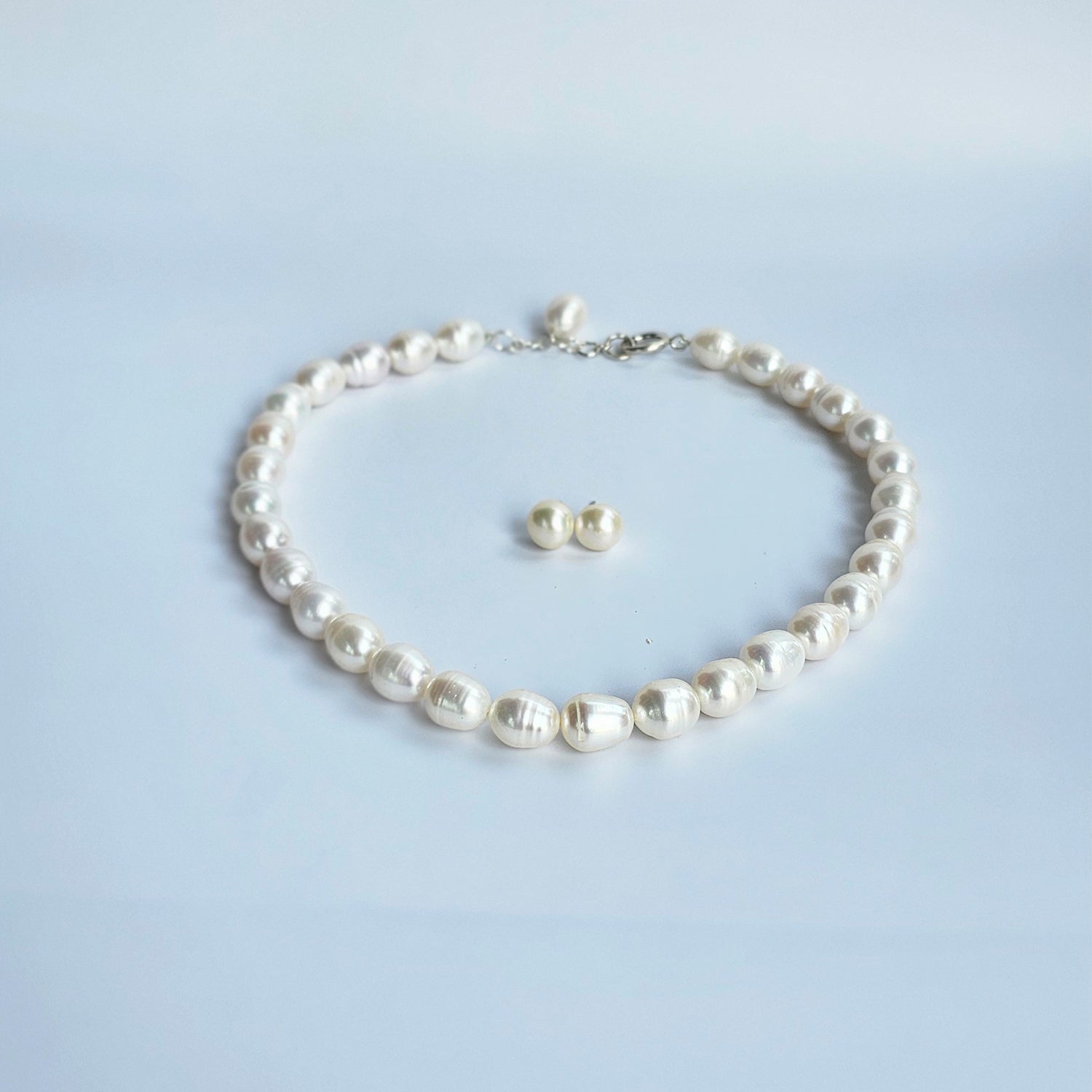 Luminous White Oval Pearl Necklace  (With Earrings)