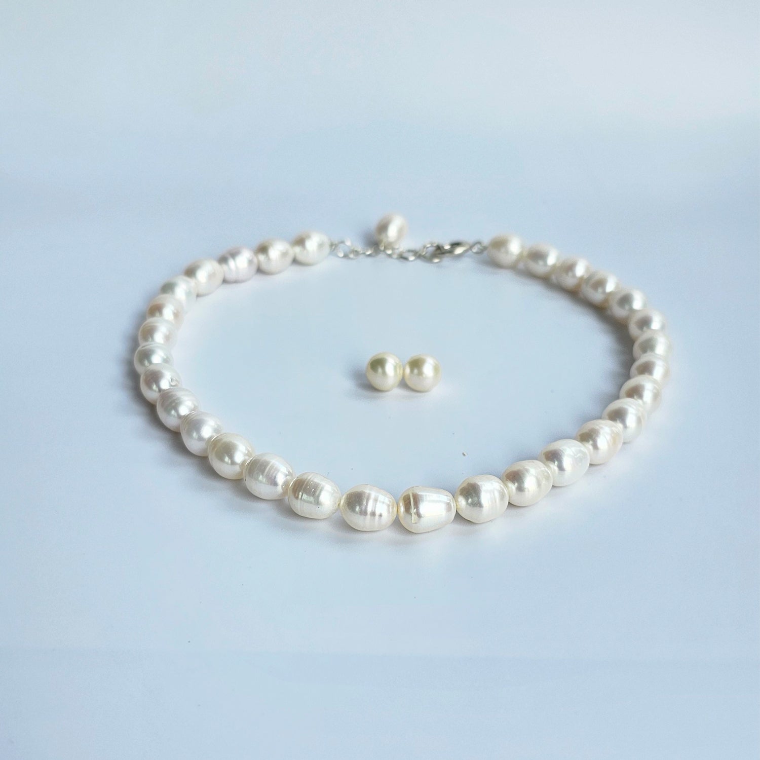 Luminous White Oval Pearl Necklace  (With Earrings)